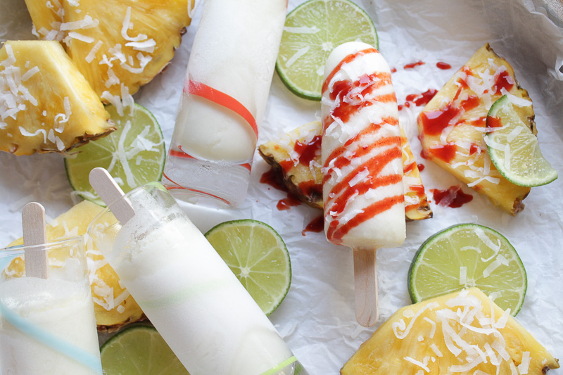 Coconut Pineapple Lime Paleta Shots drizzled with chamoy sauce